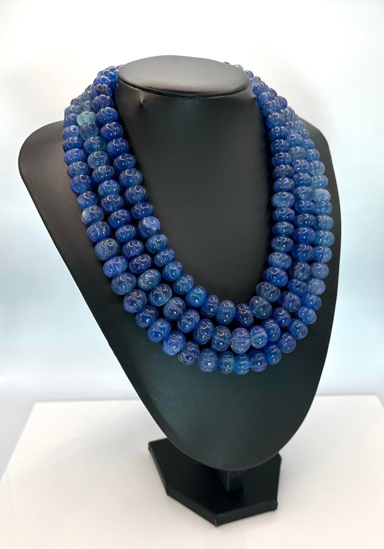 1775 Cttw Natural Mined From The Earth Blue Sapphire Necklace: Beautiful Large 1775 Cttw 3 Strand Natural Blue Sapphire Necklace. These Mined From The Earth Natural Blue Sapphire Beads Range In Size Approx. 8 x 15 mm. They all are fancy carved oval cuts displayin