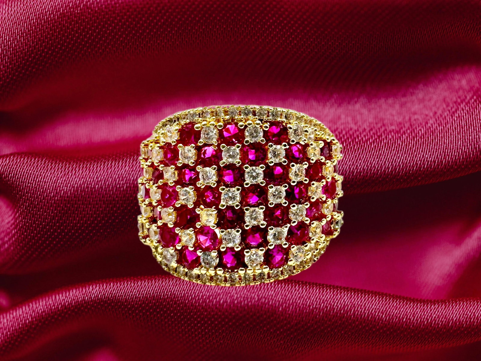 14 Kt Yellow Gold Plate 5.75 Cttw Simulated Diamond Ruby Ring: Stunning 14 Kt Yellow Gold Plate 5.75 Cttw Simulated Diamond Burma Ruby Ring. These simulated rubies are all eye-clean. They are meticulously mounted in 14 Kt. Yellow Golg Plate. The Gold Plate really