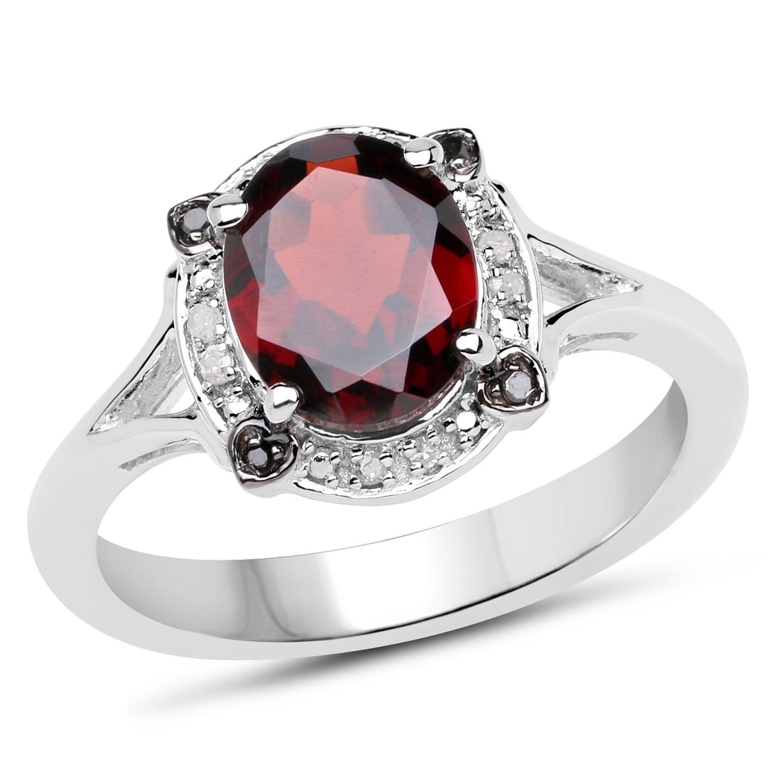 Sterling Silver 2.05ctw Garnet, Black and White Diamond Ring: 9x7mm natural oval garnet takes center stage in this rhodium plated .925 sterling silver ring, delivering a bold 2.00ctw of deep January birthstone color. The vibrant red gem is secured in a classic p