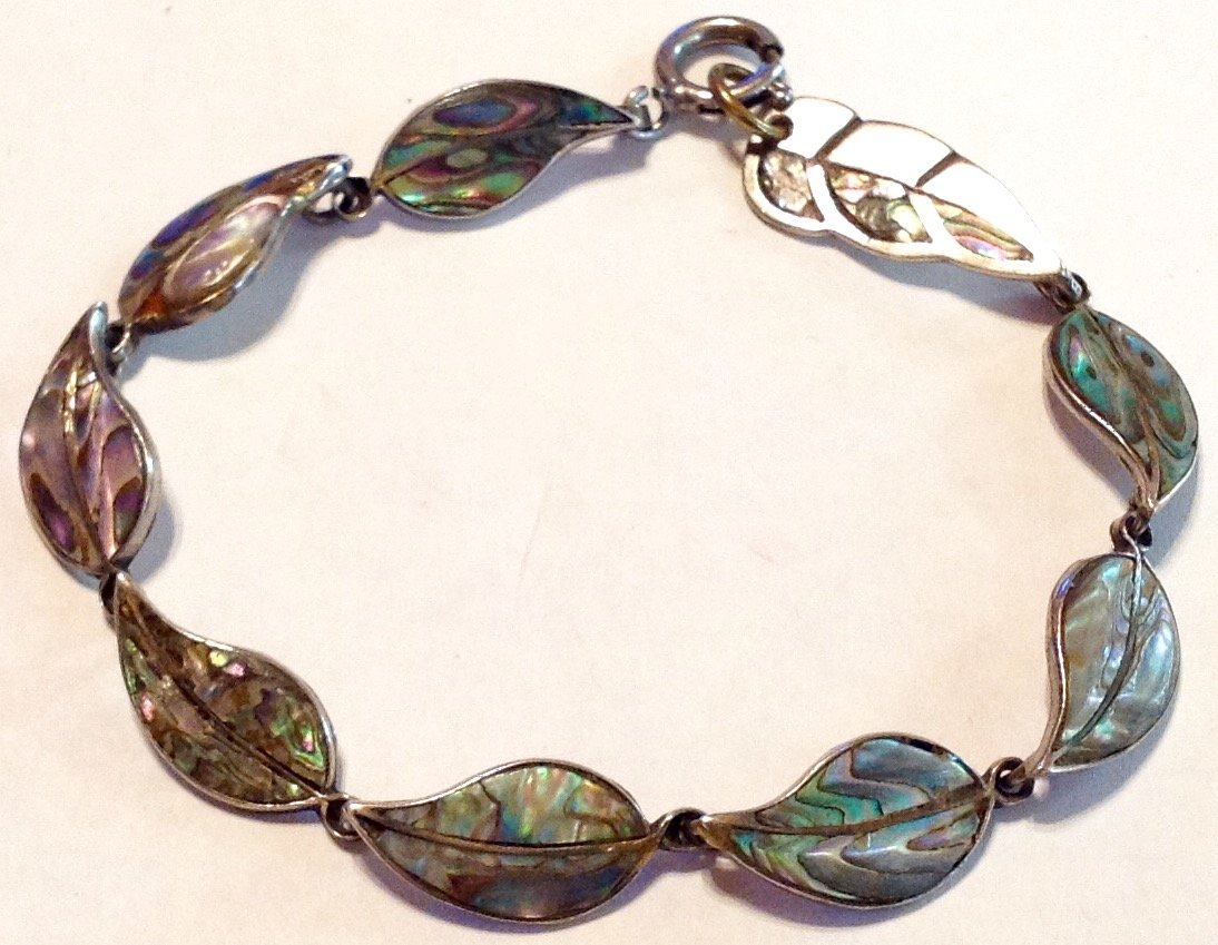 Estate old Sterling Mexico silver abalone bracelet: Estate items. Marked. 925 faded marks .... Sterling. Tested. 6.9 grams.
