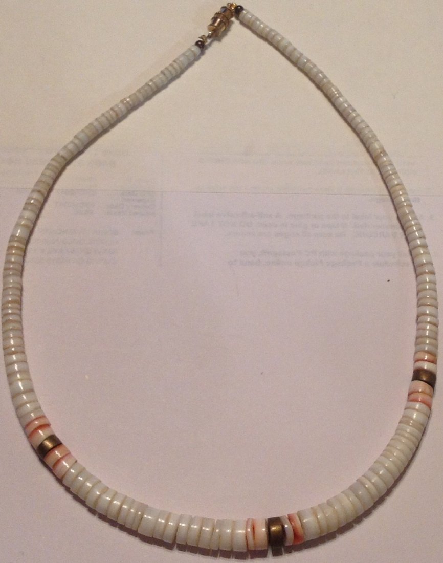 Vintage native American white coral heishi necklace.: Estate item. Marked. none. Tested. Not silver. White spiny oyster coral shell heishi beads. 16".
