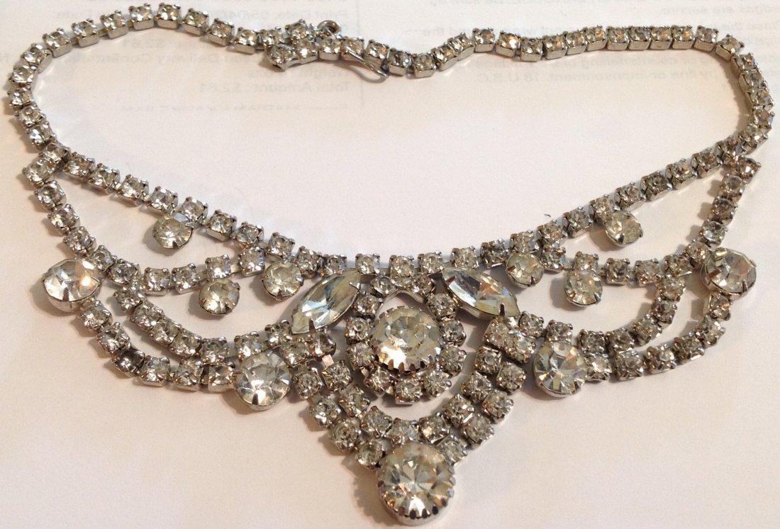 Estate vintage crystal rhinestone choker necklace: Estate items. Marked. None. Crystal rhinestone . Metal. adjustable extension. Elegant