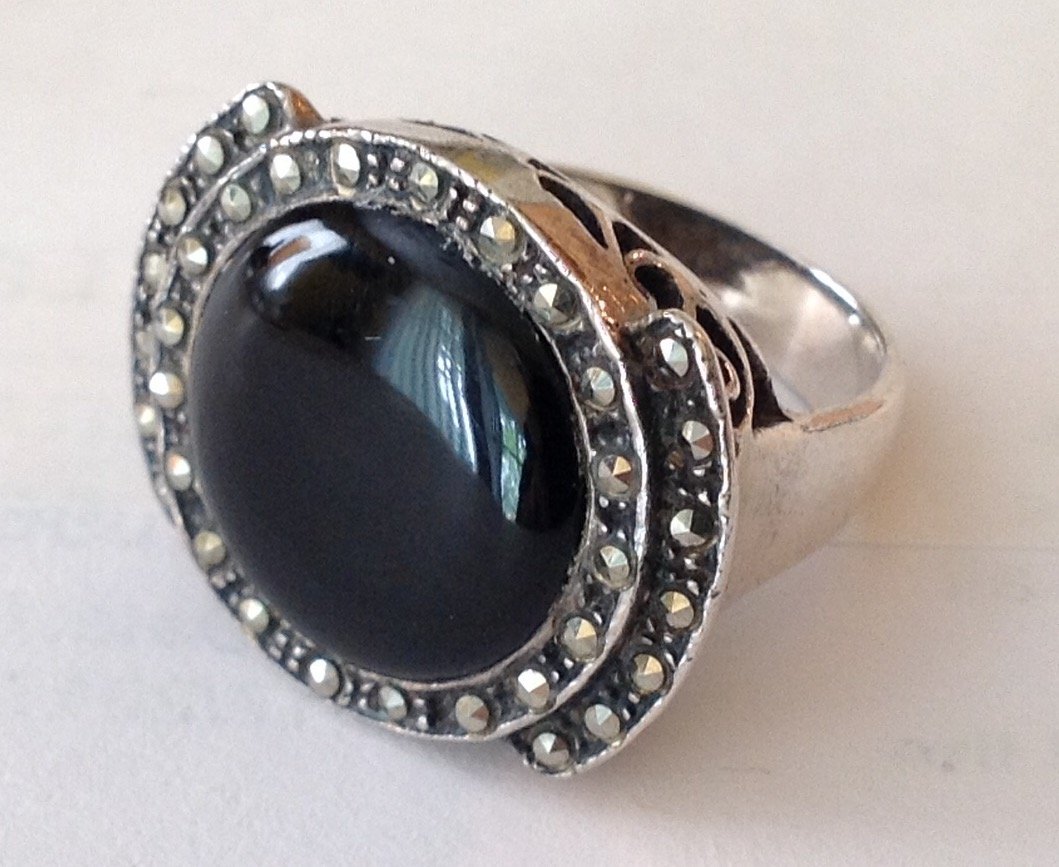 Estate vintage Sterling silver onyx marcasite ring: Estate items. Marked. 925 Sterling. Tested . . .10.6 grams. Size. 7.25