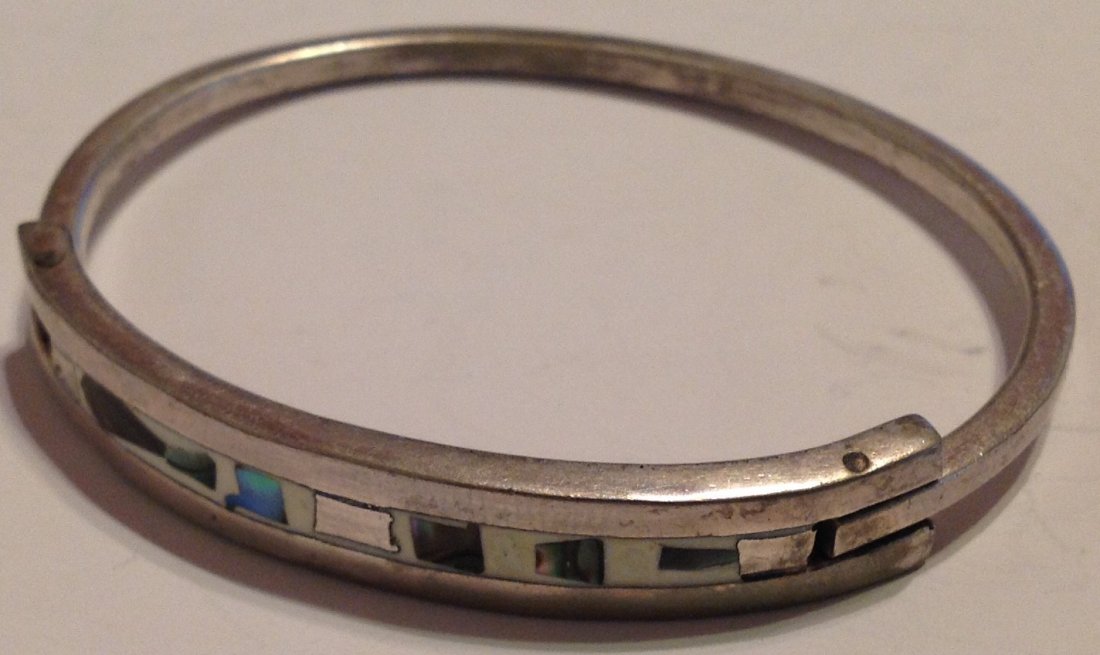 Estate old silver Abalone inlay bracelet: Estate items. Marked. None . Tested. Low silver content. Abalone inlay. 16.9 grams.