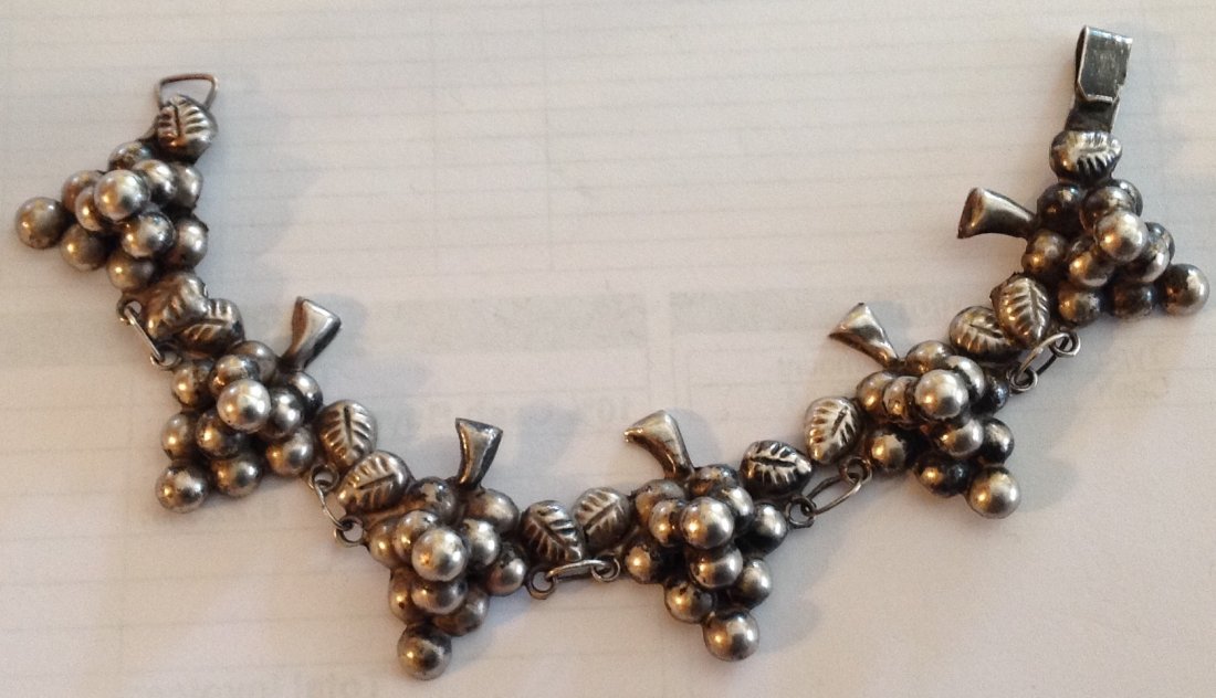 Estate antique Mexico Sterling grape clusters bracelet: Estate items. Marked.. ( Mexico made ) Tested. .Size. . See pics. 18.6 grams.