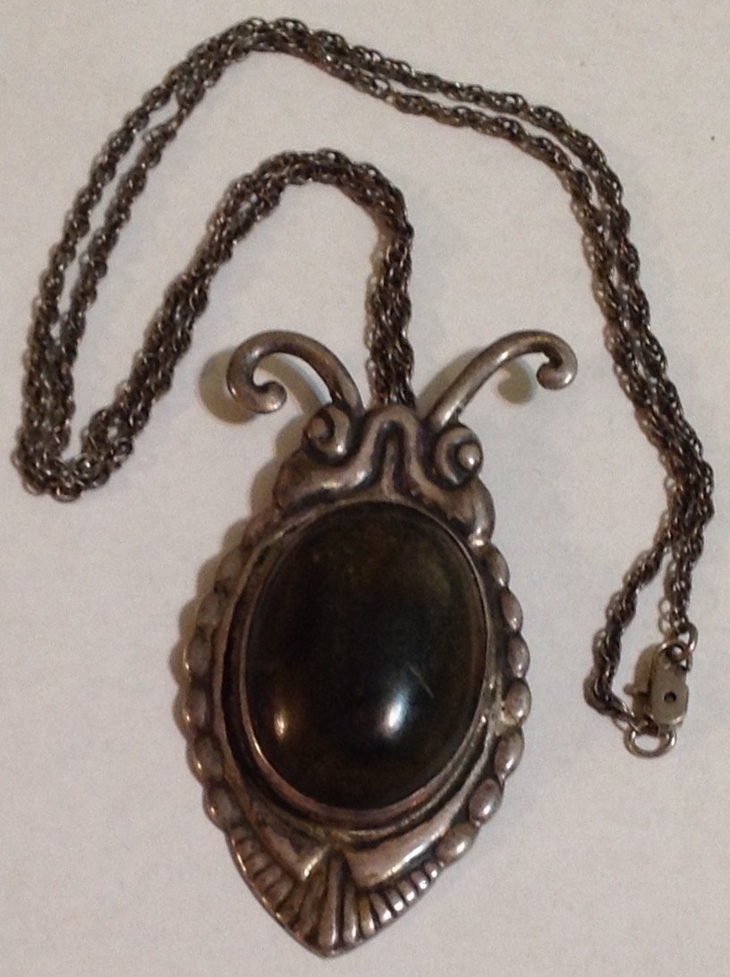 Estate antique mexico silver 925 petrified wood pendant: Estate items. Marked.. ( silver Mexico ) Tested. Sterling. Size. . See pics. 36.1 grams.