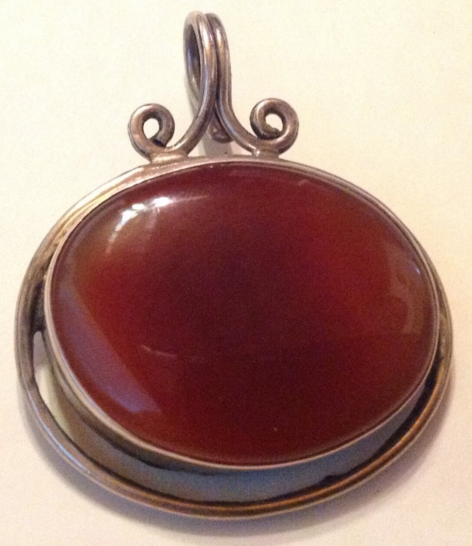 Estate vintage sterling huge carnelian pendant: Estate items. Marked. A 925 . Tested . Silver , size. See pics. 17.3 grams.