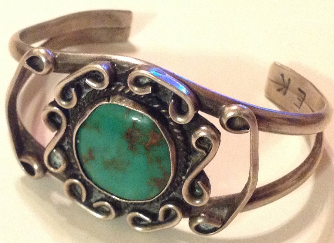 Estate Elliot Koinva sterling turquoise bracelet: Estate items. Marked. E K . Tested . Silver , size. See pics. . 32.1 grams.