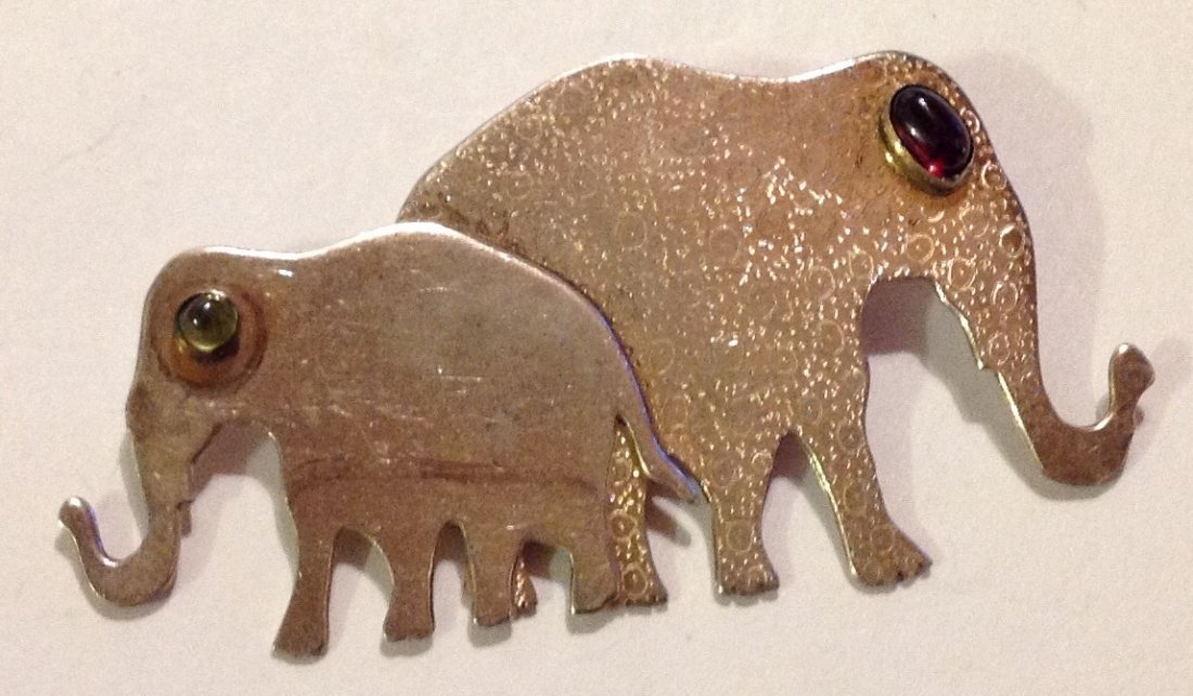 Estate vintage Iriniri sterling elephant brooch (R): Estate items. Marked. Iriniri sterling . Size. See pics . Tested. Silver. W. 9.5 grams.