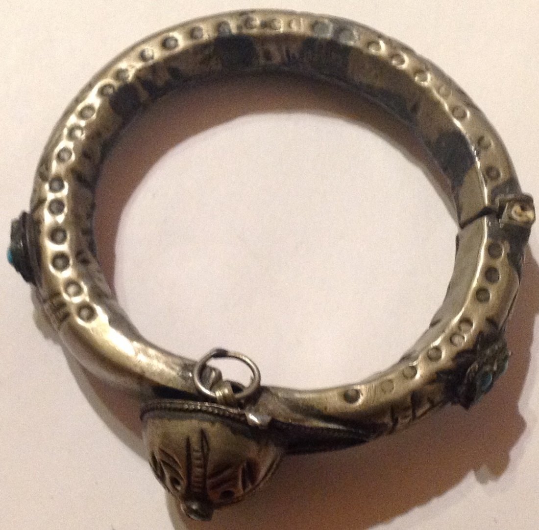 Estate old primitive arabian metal hinged bracelet (R): Estate items. Marked. None . Size. See pics . Tested. Not Silver. W. 7.5 grams.