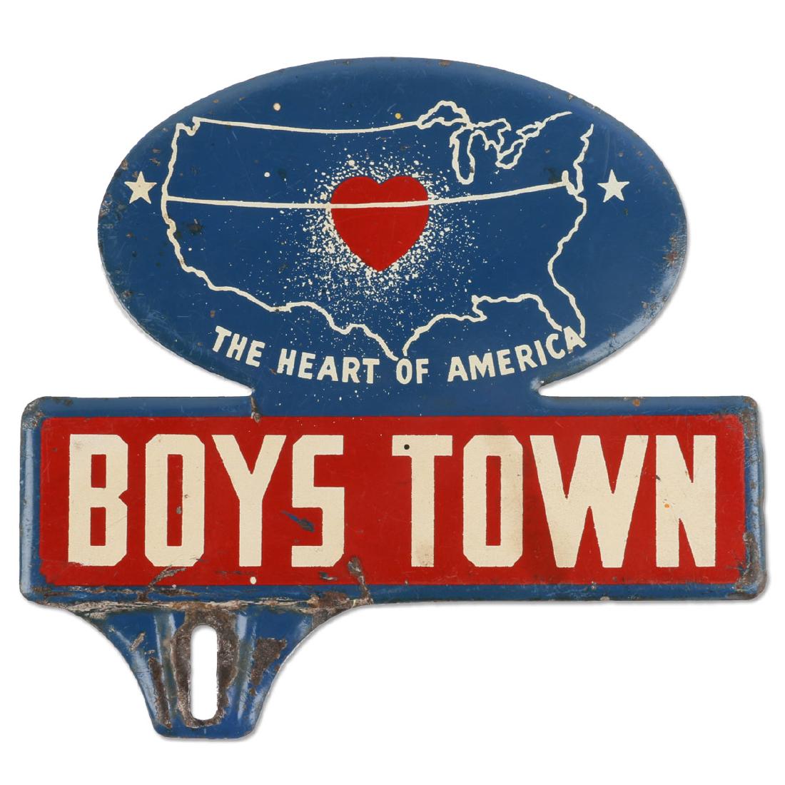 Boys Town “The Heart of America” Lithographed Metal: Die-Cut plate topper souvenir from “Boys Town - The Heart of America”. Surface exhibits paint wear and a small split along the lower edge. Most flaking is isolated around the mounting hole. Measur