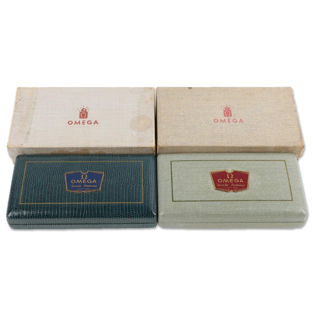 Two (2) NOS Omega Seamaster & Century Jewellers Display: Outer box exhibits light soiling and wear, inner box in excellent, complete condition. These were discovered as part of the contents of a now-defunct jewellery store.