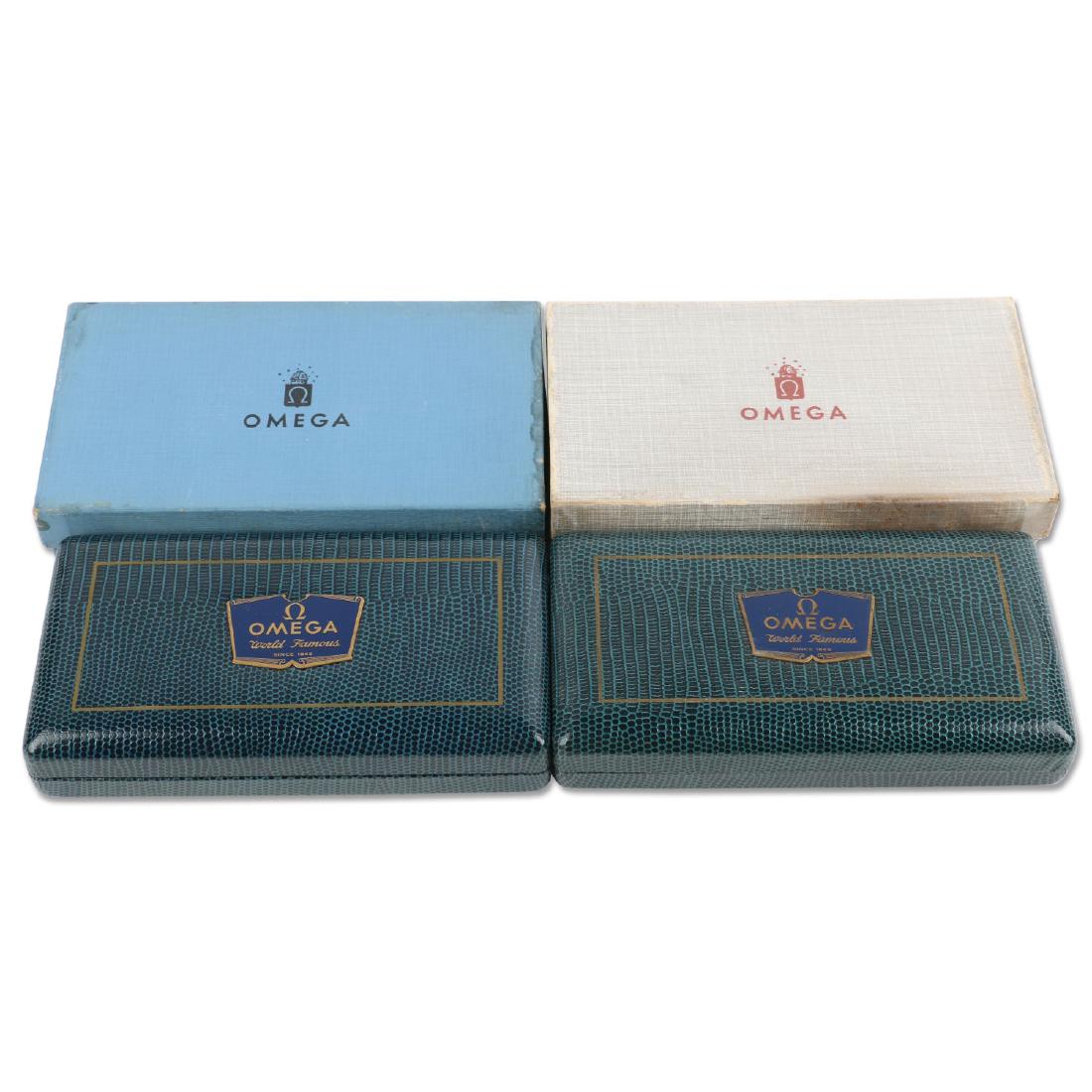 Two (2) NOS Omega Automatic & Century Jewellers Display: Outer box exhibits light soiling and wear, inner box in excellent, complete condition. These were discovered as part of the contents of a now-defunct jewellery store.