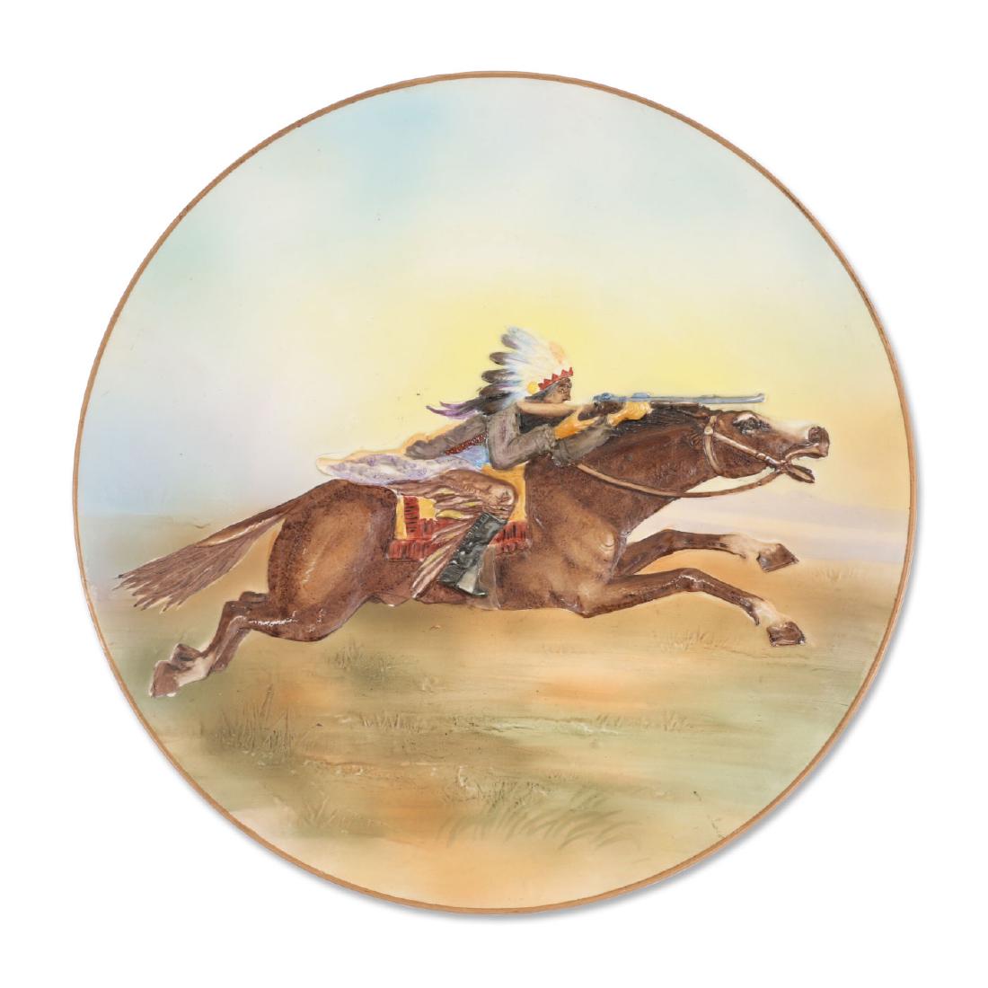 Nippon Native & Rifle Porcelain Plate: Lot 508 - Nippon "blown-out". Hand pained in relief. 10.75â€ dia. No restoration or flakes. $300-400.