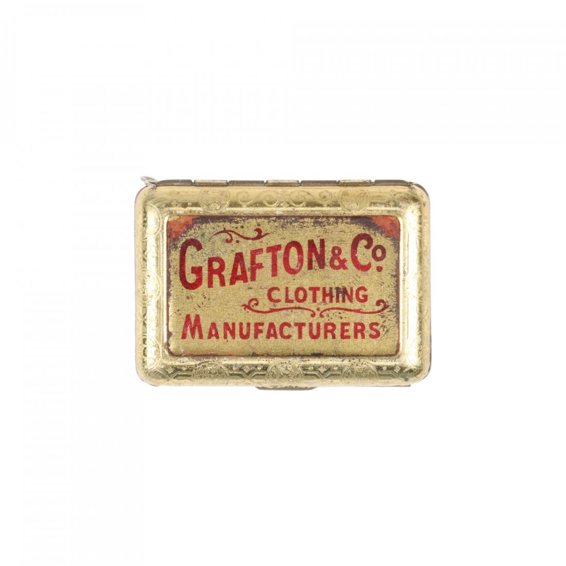 Grafton & Co Tin Litho Vesta: English. Circa 1910. Lithographed tin match safe. Grafton & Co. Clothing Manufacturers. Embossed, "Bryant & May's Wax Vestas". Rear is ribbed for striking matches. 1.75" x 1.25". Minor surface oxidati