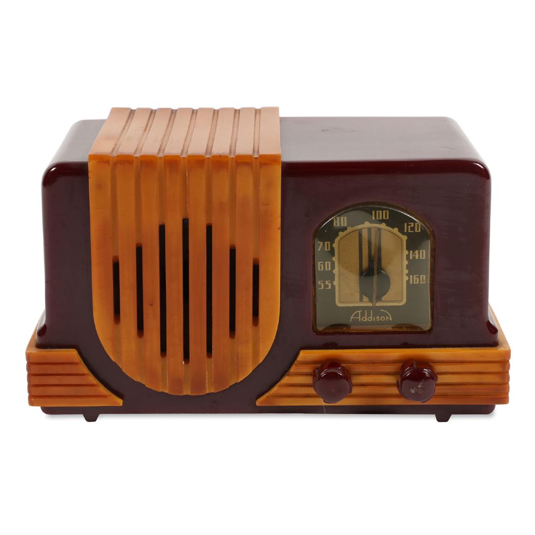 Addison A2 "Baby" Catalin Radio: Canadian. Circa 1940. Catalin case. Made in Toronto, Ontario. Plum with butterscotch trim. 10.25" x 6" x 5". Untouched original condition. Bakelite case is free from hairline cracks, chips, warp or tu