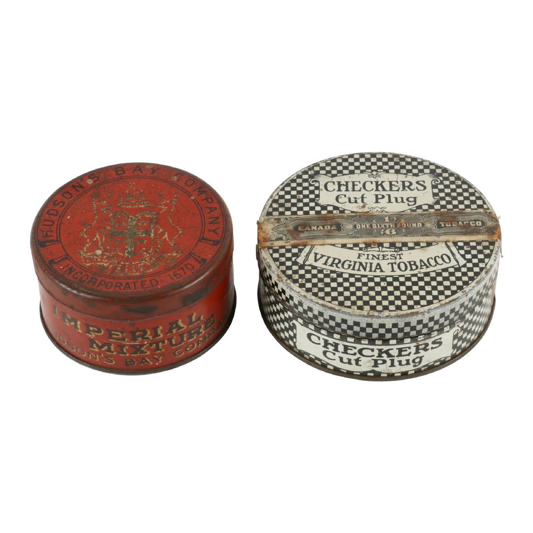 Canadian 1/6 lb. Tobacco Canisters: Two (2). Canadian. Puck tins. Hudsonâ€™s Bay Company Imperial Mixture and Checkers Cut Plug. Checkers 1/6 pound size. Typical surface wear with mild oxidation. $100-200.