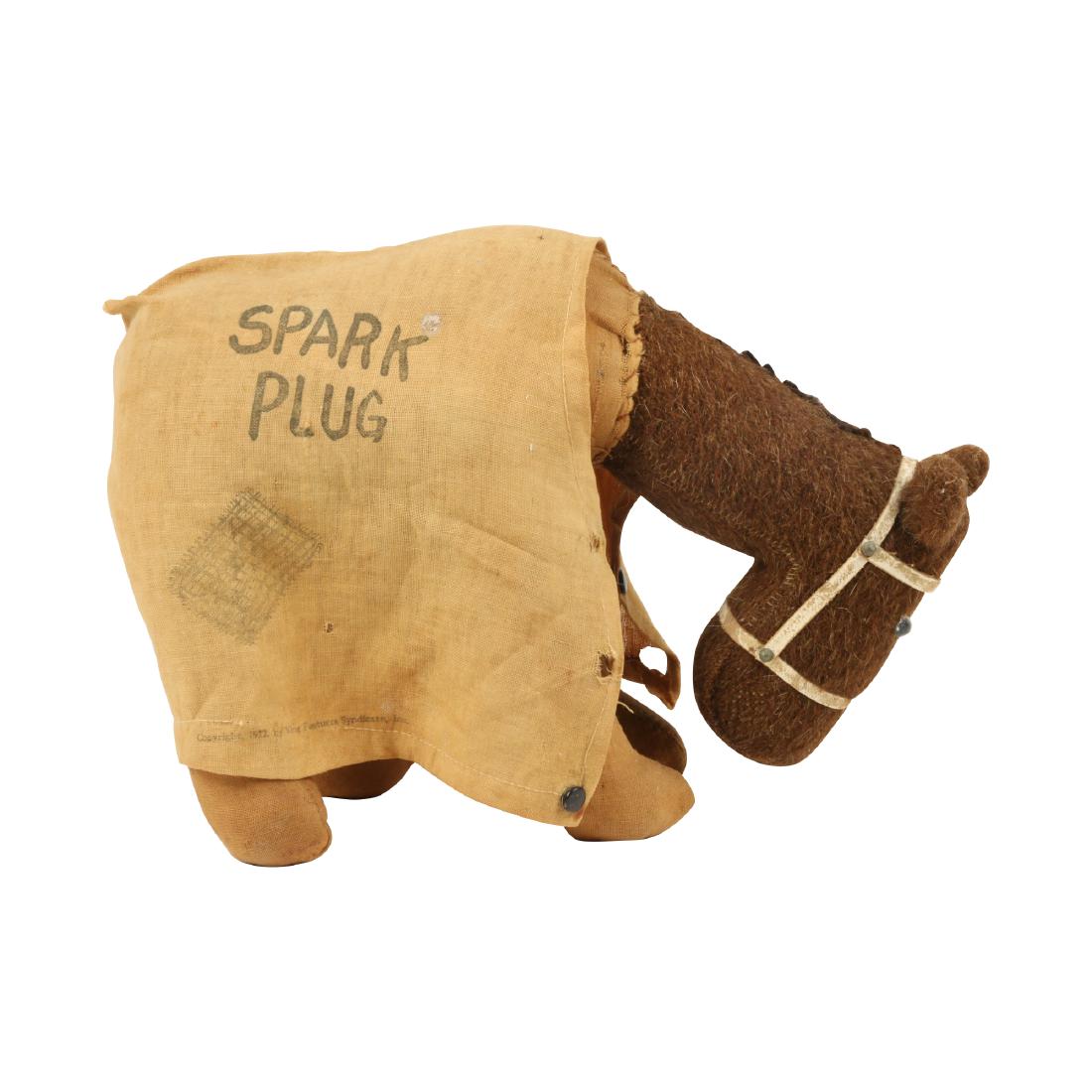AC Spark Plug Horse Doll: American. Circa 1932. Marked, "Copyright 1932 King Features Syndicate, Inc". Spark Plug is a Barney Google Publications cartoon character who also appeared as a mascot for A-C Spark Plugs during the 1