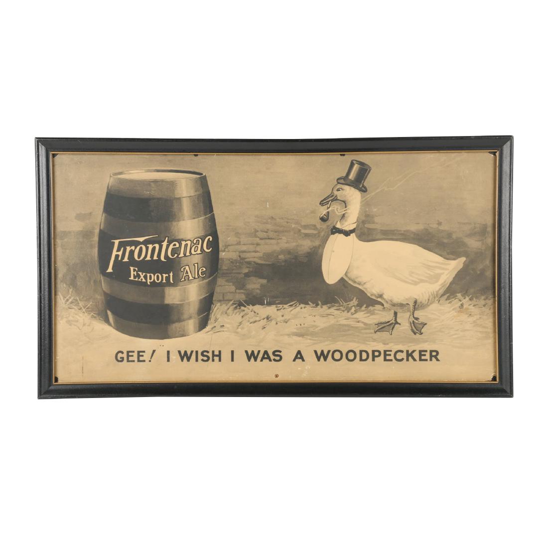 Frontenac Export Ale Framed Paper Sign: Canadian. Circa 1940s. "Gee! I Wish I was a Woodpecker". Framed paper-under-glass. 22" x 12" A few holes along the upper and lower edges. Small tears at each corner. $150-250.