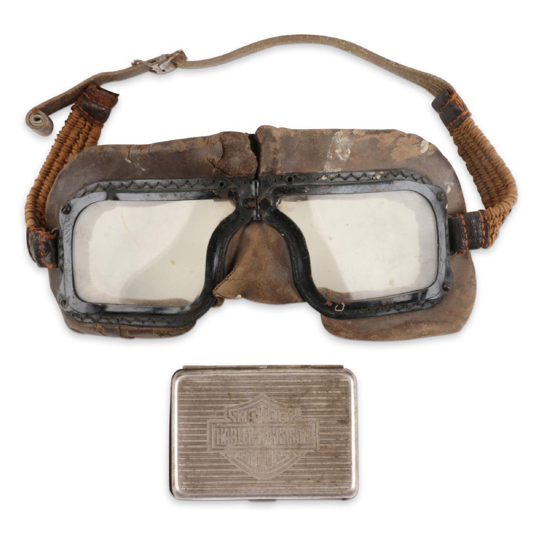 WW2 Goggles, Harley Davidson Case: Two (2). 1940s. R.C.A.F Pilot's Goggles, 1942. Harley-Davidson Motor Cycles 3.5" x 2.75" Both complete. 100-200