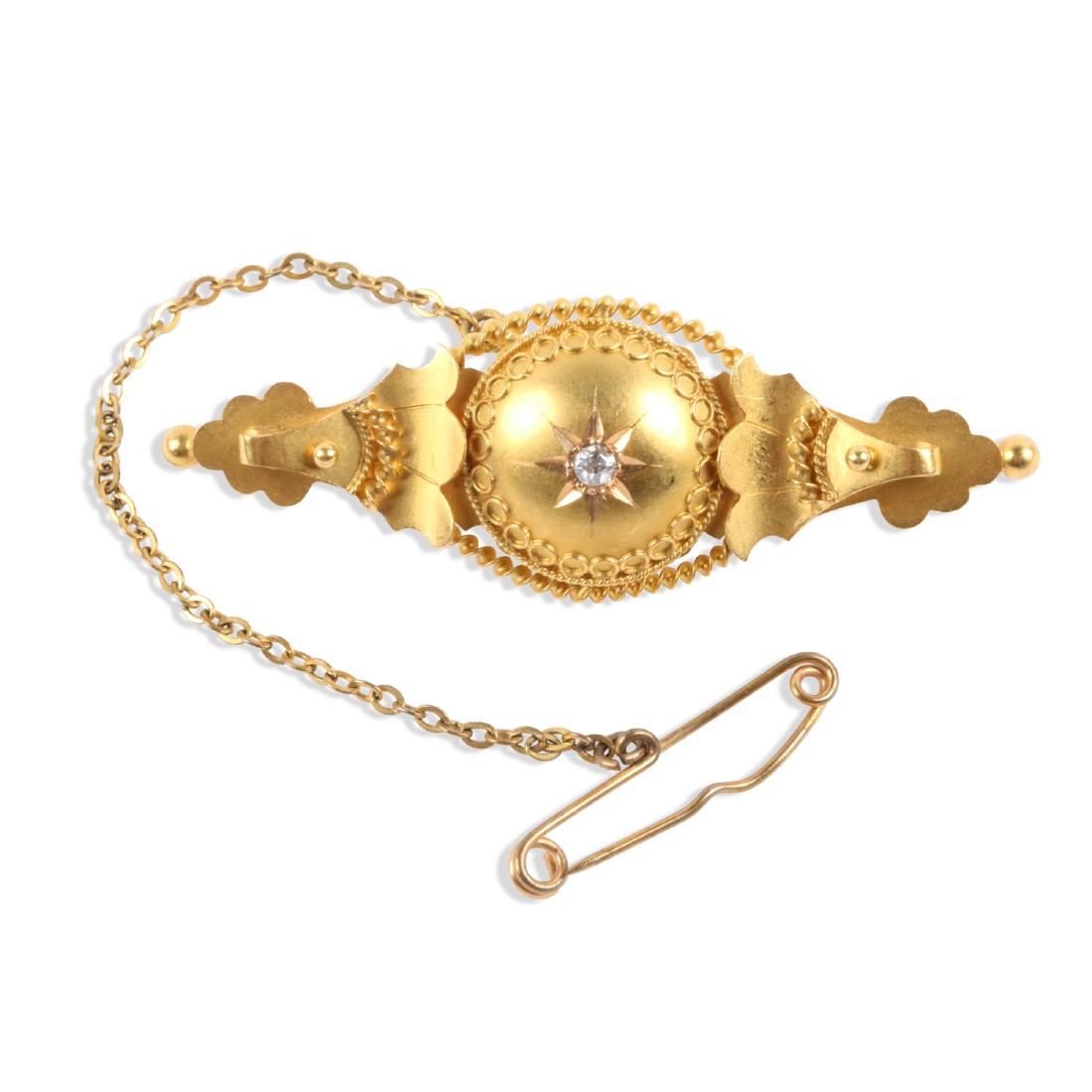 A Victorian 15K Yellow Gold & Diamond Bar Pin: QUANTITY: 1. MEASUREMENTS: 42mm x 15mm. GROSS WEIGHT: 4.4g. NOTES: Diamond has minor chip to table. Two sets of hallmarks, rear. ".585 15K/Ce & Fd Ld" rear. Est. $100-150.