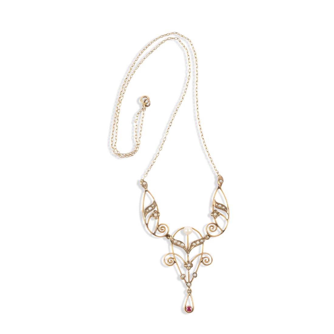 An Edwardian 10K, Pearl & Tourmaline Necklace: QUANTITY: 1. MEASUREMENTS: 43.2cm. GROSS WEIGHT: 4.8g. NOTES: Marked, "10k" rear. Est. $100-150.