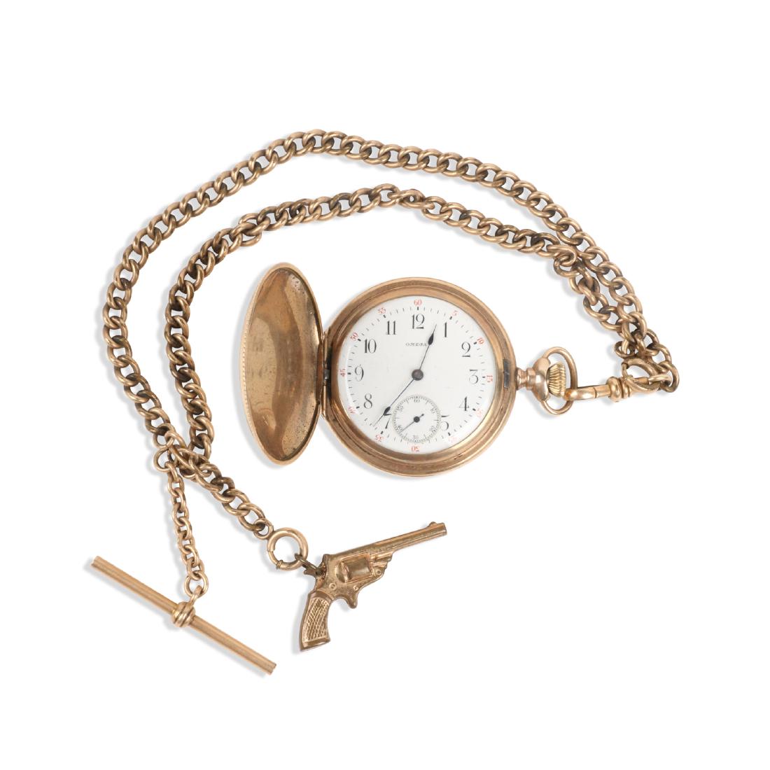 Omega, Lady's Pocket Watch: QUANTITY: 1. CASE MATERIAL: 14K Gold Filled. SIZE: 1 3/8" Dial Diameter. GROSS WEIGHT: 89.9g. NOTES: Includes chain with pistol fob. EST. $100-200. DISCLOSURE: Watches were running at time of photogra