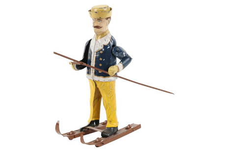 Early German Wind-up Skier Toy: Germany. 1920s. 5" x 7" x 2.5". Working condition. Minor soil, wear. 400-600.