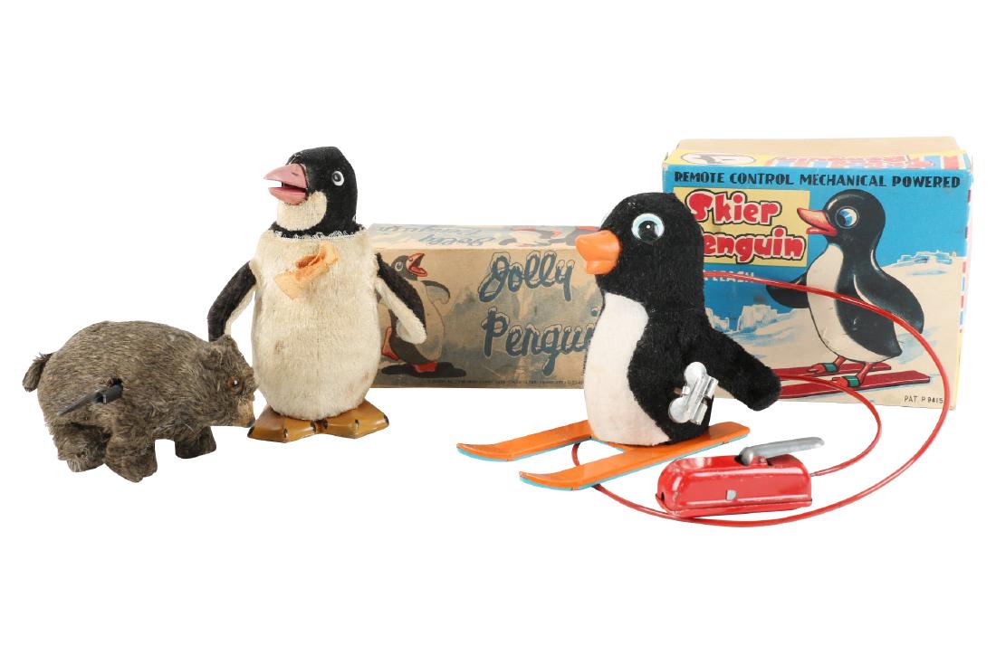 Japan Mechanical & Wind-up Toys: Japanese. Two (2). Circa 1960. One labelled, "Modern Toys Japan". Largest (h) 5". Excellent with minor wear in working condition, two with box, one wind key. 100-200.