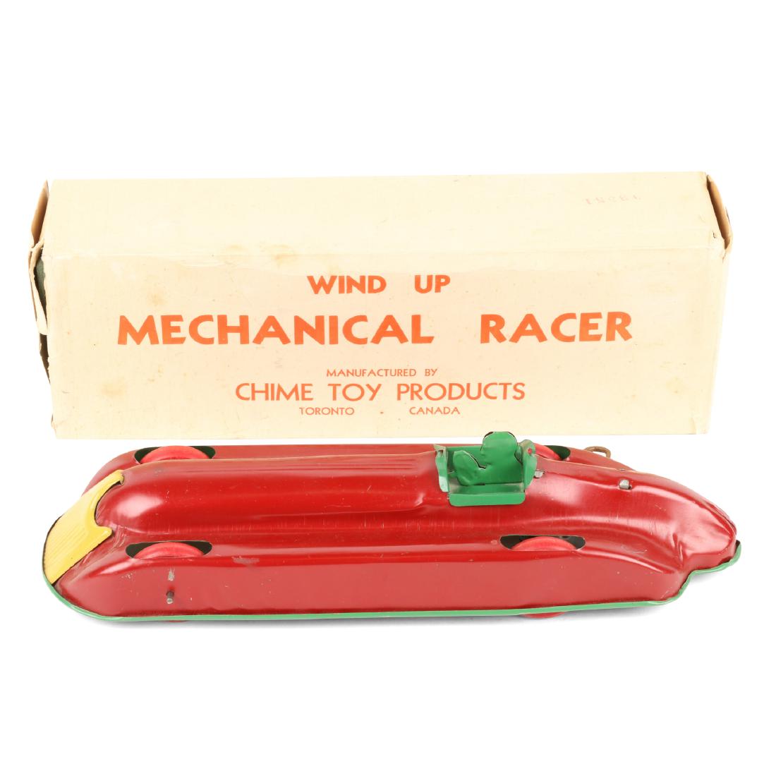 Mechanical Wind Up Racing Car: Stamped inside. 13" x 4" x 3". Minor scuffs. All original, no restoration. Functioning. Est. $200-300