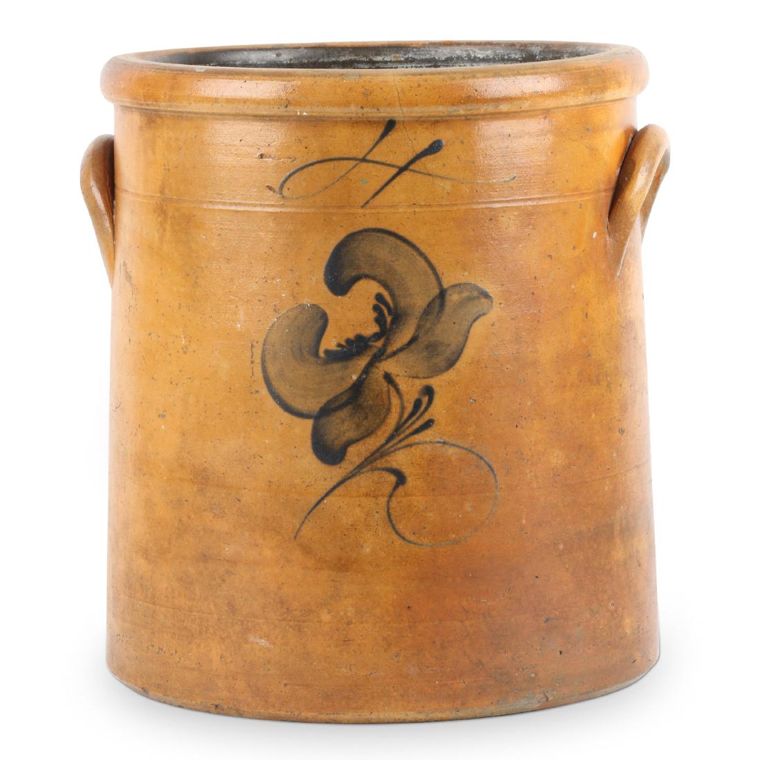 Decorated Stoneware Crock: Probably American. 1870s 80s. 12" x 12" x 11". One hairline extending downward 2.5" from rolled edge of opening. Est. $75-100