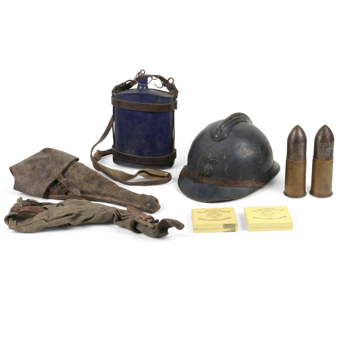 WW1 French Adrian Helmet, Accessories: French. WW1. Model "M15" helmet, created in 1915 primarily for trench warfare. Made of lighter-weight steel for protection from shrapnel injury. Conservation in metal made it less expensive to produce