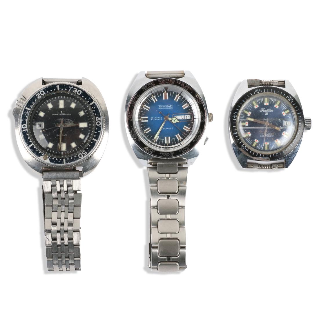 1970s Diver Wristwatches: Three (3). 1.5", 1.75". Unknown service history. Seiko, Tradition watches are running. Gruen is not running. Each exhibits fine case scratches.
