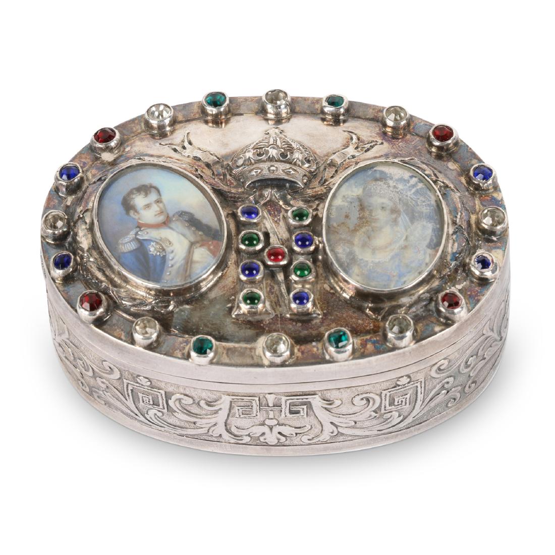 Napoleon-Inset Sterling Box: Circa 1805. A sterling silver box tributing Napoleon and Josephine prior to the end of their ill-fated marriage. Hand-painted miniature portraits of each are inset. The perimeter of the lid encircled 