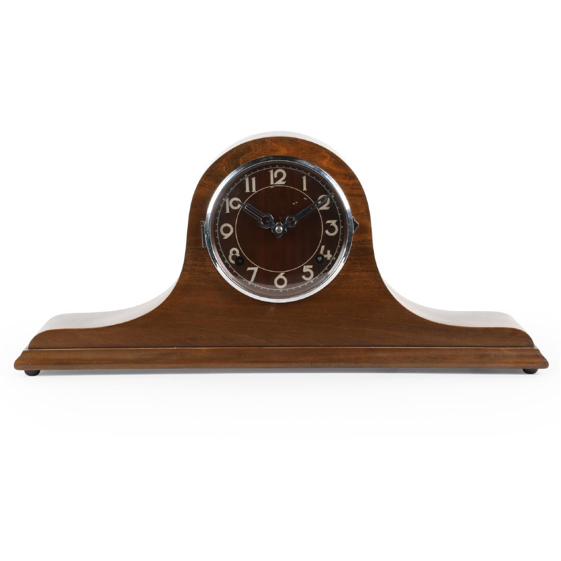 Pequegnat "Dandy" Shelf Clock: This example features the rare Art Deco dial, bezel and hand combination offered solely on the latest models made by Pequegnat. Full paper label is attached to interior back door marked, "Dandy Eight-