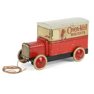 Rare McCormick's Figural Truck Biscuit Tin: Canadian. Lithographed tin. Rare. This figural biscuit tin was designed to be used as a toy after the product was consumed. Features detailed lithographed body, removable roof lid, and pullstring. One