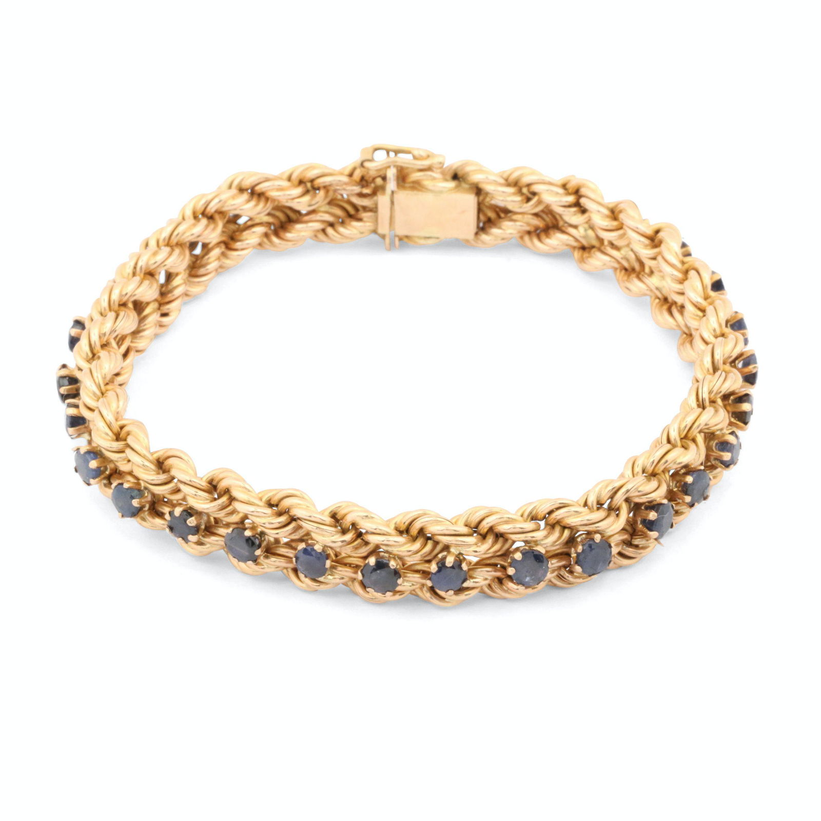18K Yellow Gold Sapphire Bracelet: 18K Gold. Weight: 21.97g gross. Contains 30 sapphires, approximately 3 mm each of medium to dark blue in colour. Accompanied by certificate of appraisal. Est. $600-800.