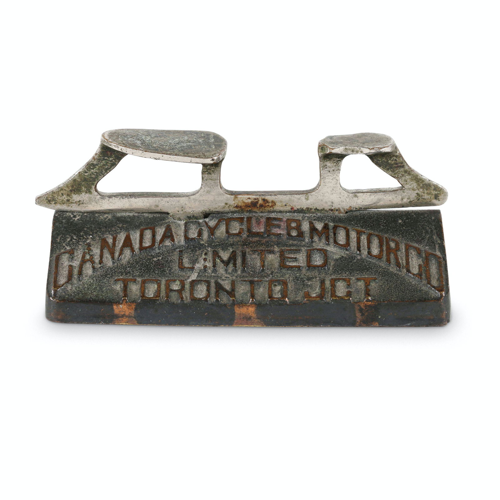 CCM Figural Advertising Paperweight: Base 3" x 1.75". Height 1.25". Canadian. Circa 1913. Created as an advertiser when the factory was located at the Toronto Junction in the old Losier (Cleveland Bicycles) plant. A figural skate blade o