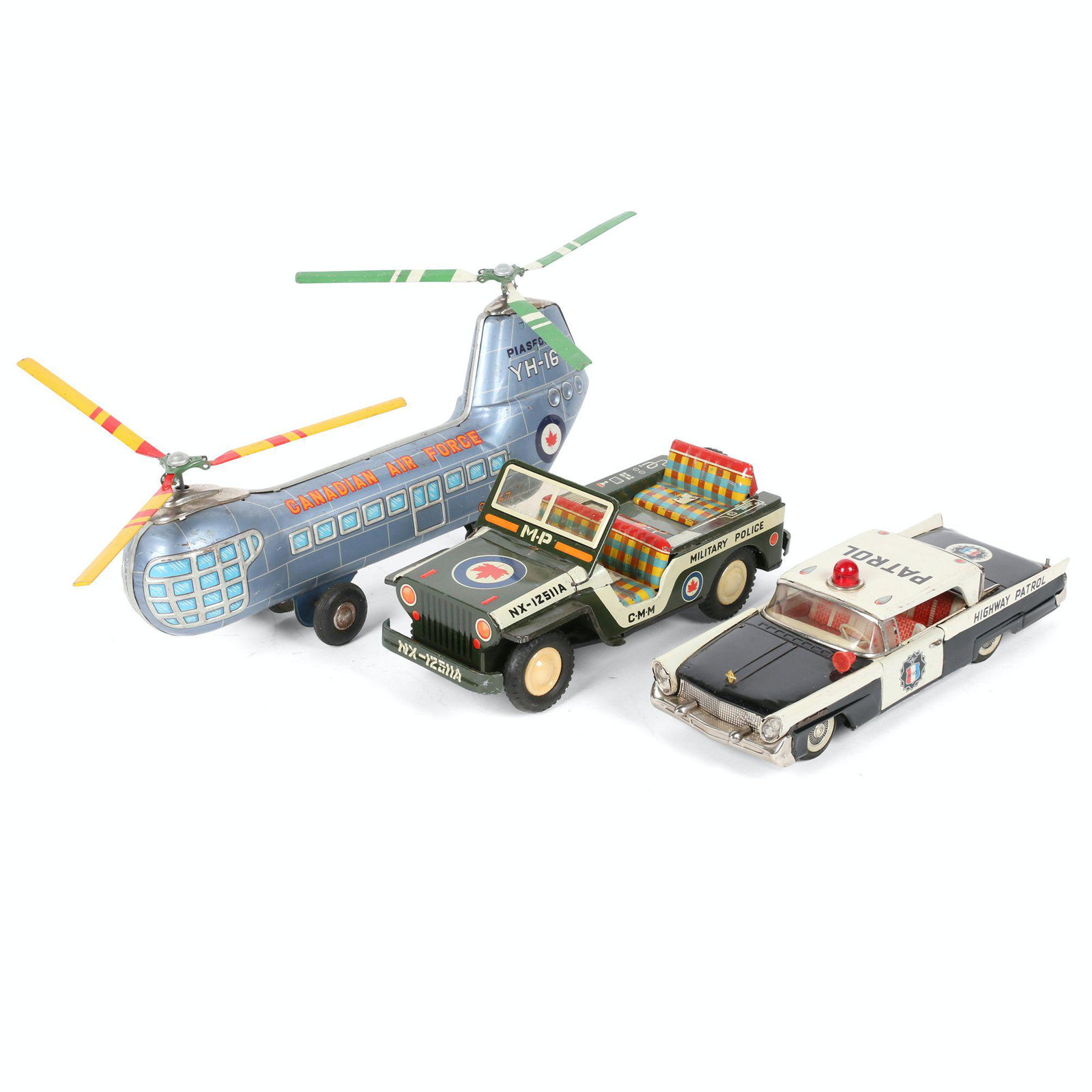 Japanese Friction Cars & Helicopter: Three (3). 11 - 16" (l). Includes Lincoln Continental Patrol, Military Police Jeep and Canadian Air Force helicopter.