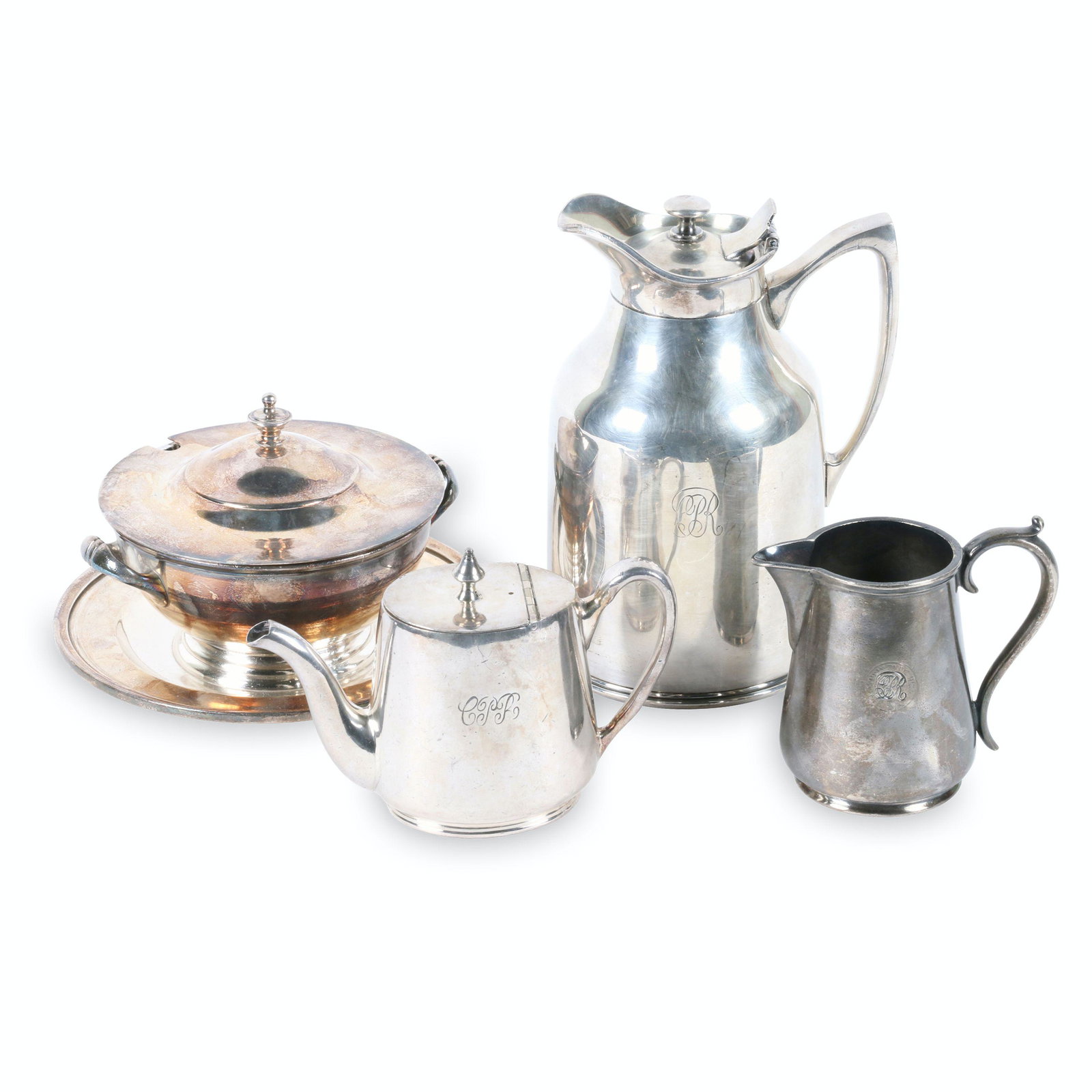 Canadian Pacific Railway Silverware: Four (4) pieces. Circa 1920s - 1930s. Silverplate thermos, sugar, teapot and creamer. Each engraved with "CPR" emblem and stamped underneath.