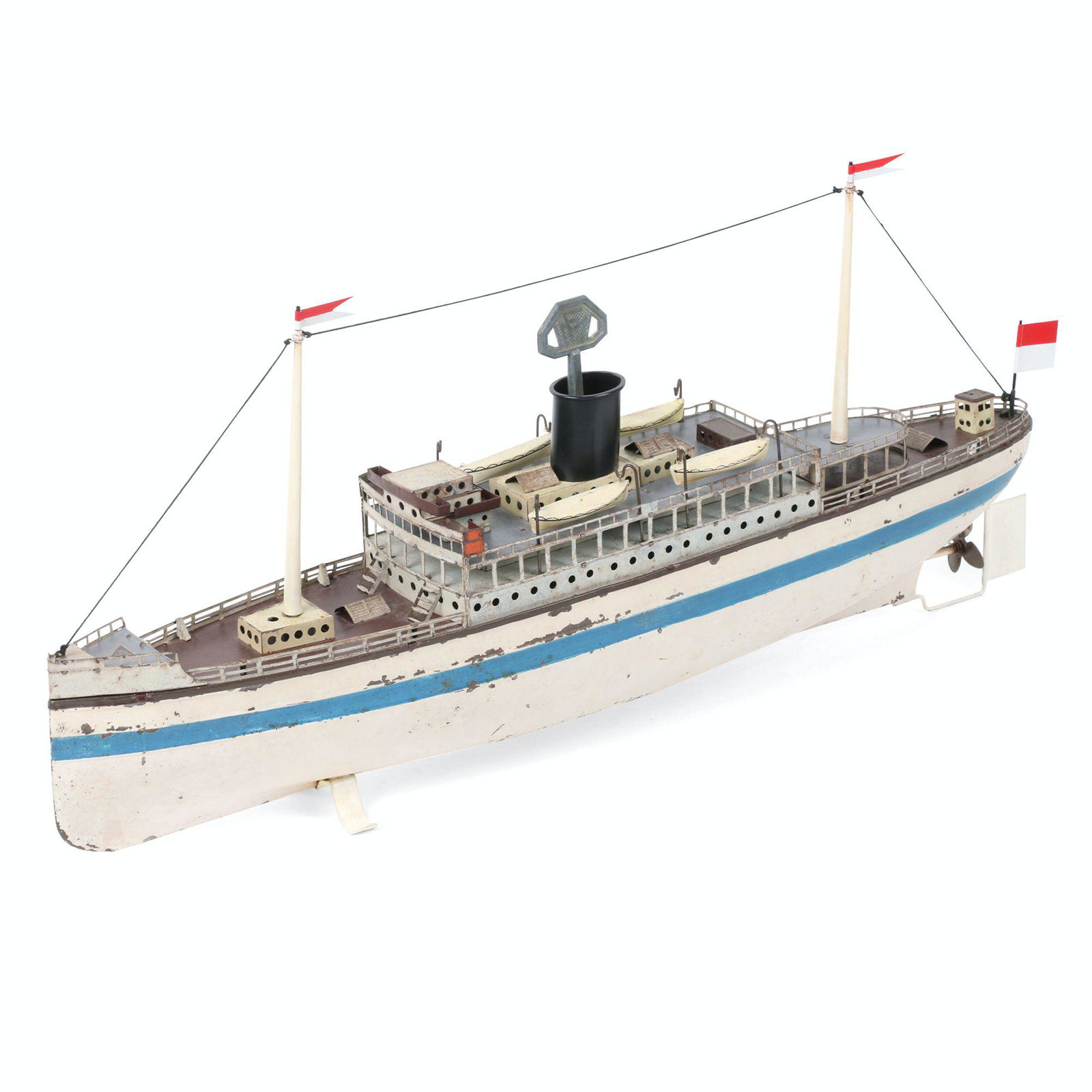 Fleischmann Tin Ocean Liner Toy: German. 20.5" x 9" x 3.25". Marked, "GFN" on decal, bow. Functioning Flags and string professionally replaced. Scattered paint flakes.