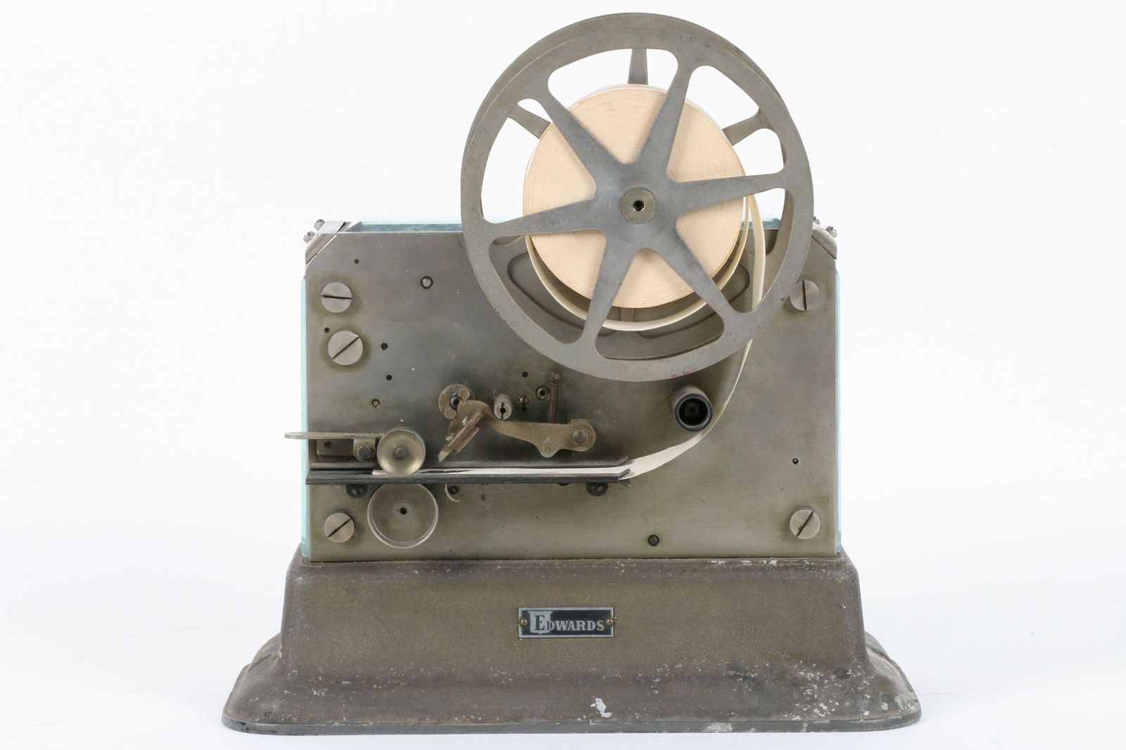 Edwards Mechanical Stock Ticker: American. Circa 1940s. Tagged, "Edwards" front base. Case features three sides set with beveled glass for display purposes.