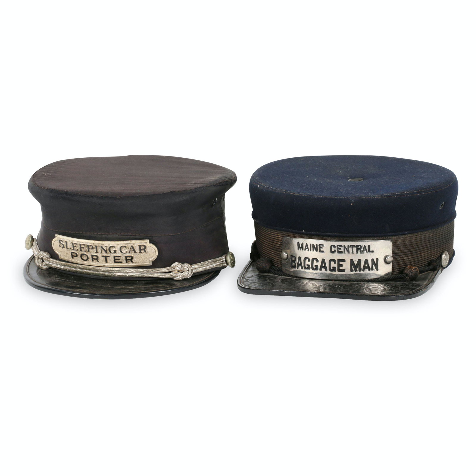 Railway Porter & Baggage Carrier Caps: Two (2). Each 10" x 7" x 3.5". Size 7 1/2 and Size 7. Maine Central cap marked, "L.P. Hatch 47 Winter St, Boston" inner liner. Porter cap marked, "William Scully Limited, Montreal" inner liner.