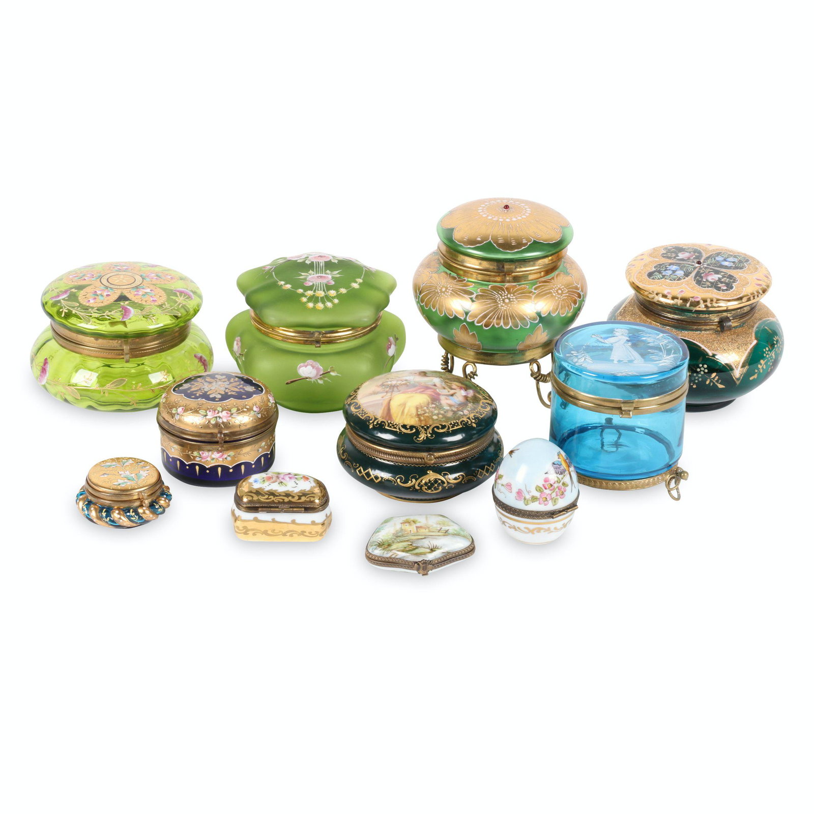 Victorian Powder, Patch & Pill Boxes: Eleven (11). Victorian powder, patch and pill boxes. All enamelled, some Bohemian blown glass. Includes a Royal Vienna style box with shield 'beehive' mark and titled with maiden and cupid, egg box wi