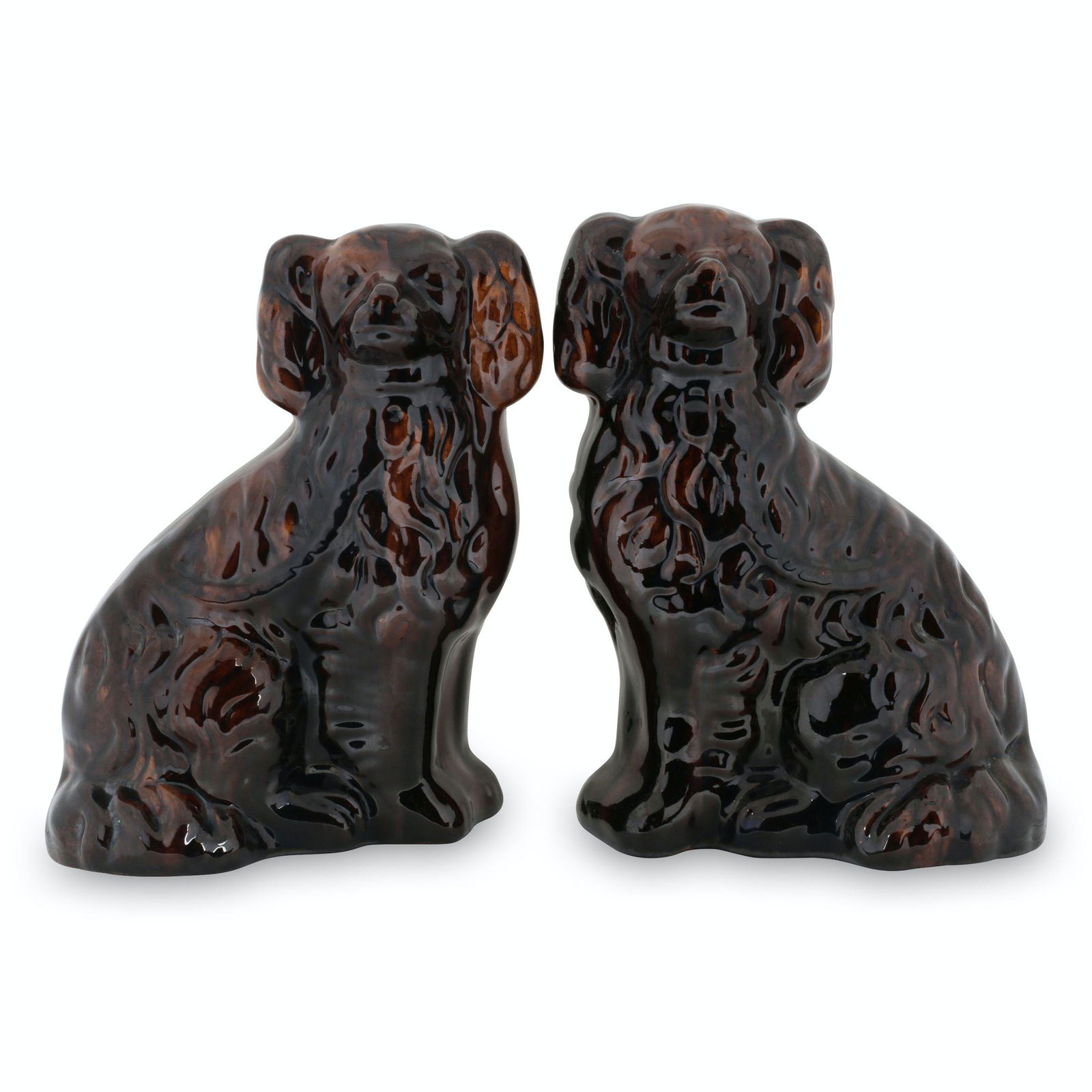 Pair (2) Ontario Redware Spaniels: Two (2). Canadian. Earthenware. 9" x 6.5" x 3.75" each. One exhibits minor .5" base edge flake. John Wine Collection. $600/800.
