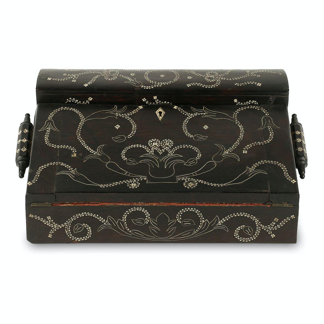 Anglo Indian Traveller's Desk: 19th century. Inlaid ebony of Anglo-Indian origin. Hinged writing slope fitted for inkwells. 14" x 5.75" x 9". $200/300.
