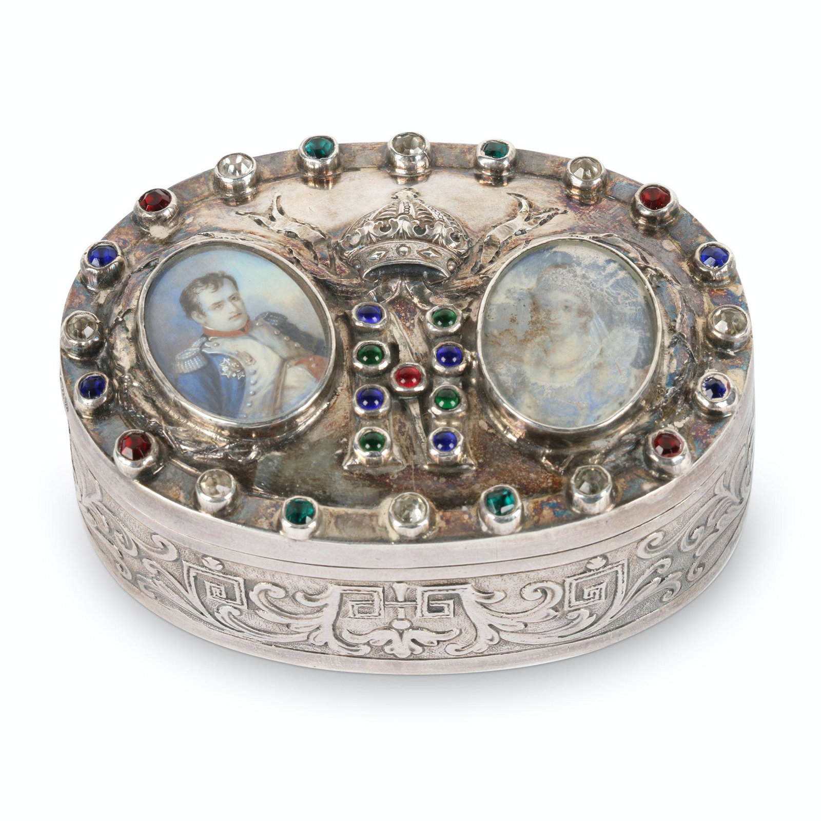 Napoleon Inset Sterling Silver Box: Circa 1805. A sterling silver box in tribute to Napoleon and Josephine prior to the end of their ill-fated marriage. Hand-painted miniature portraits of each are inset. The perimeter of the lid is enc