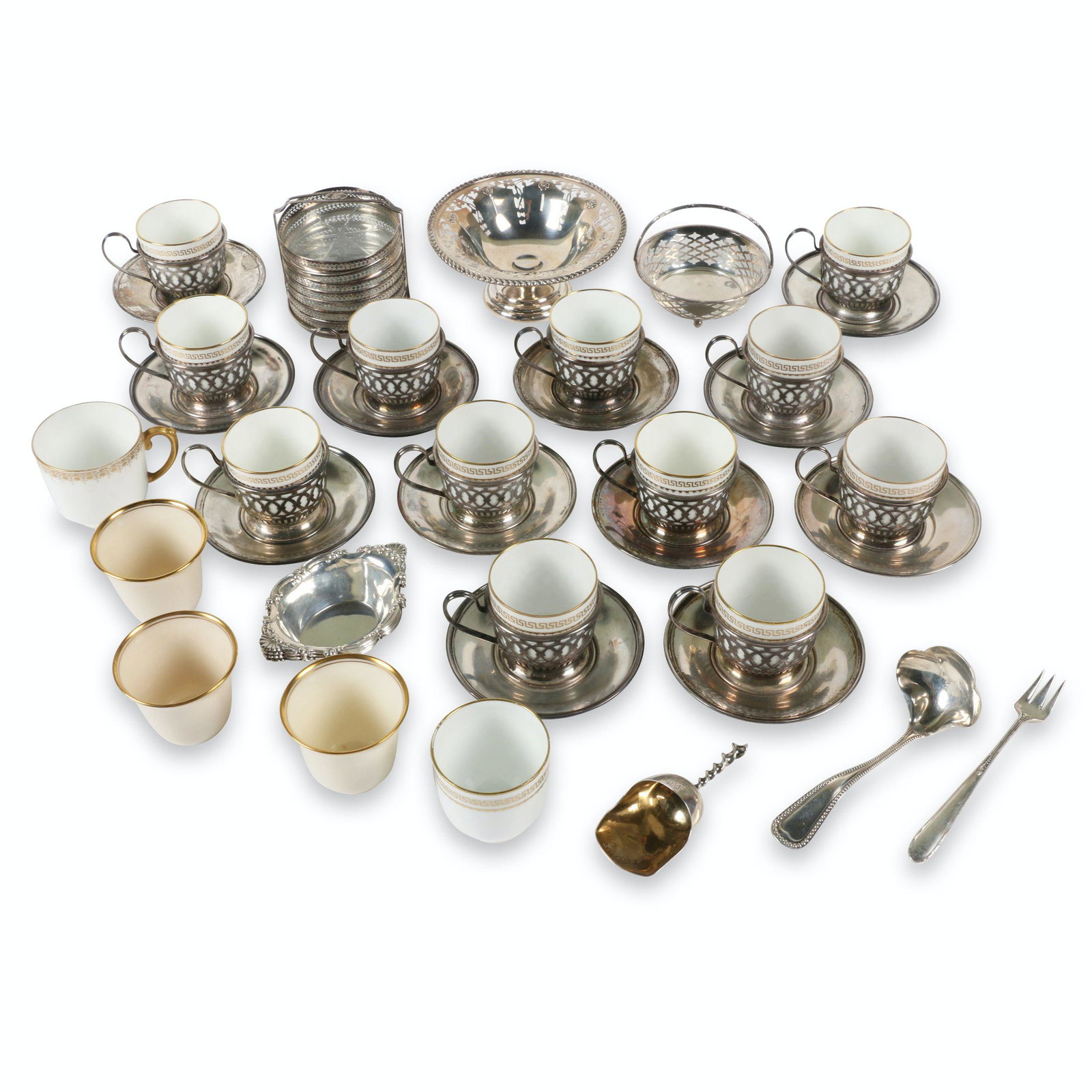 1008g Sterling Silver Cordial Set: Includes a set of 12 porcelain inserts from retailer 'Thomas Goode & Co. of London, England, sometime after 1918 in sterling silver with separate sterling silver saucers. A few Lenox and Limoges inser