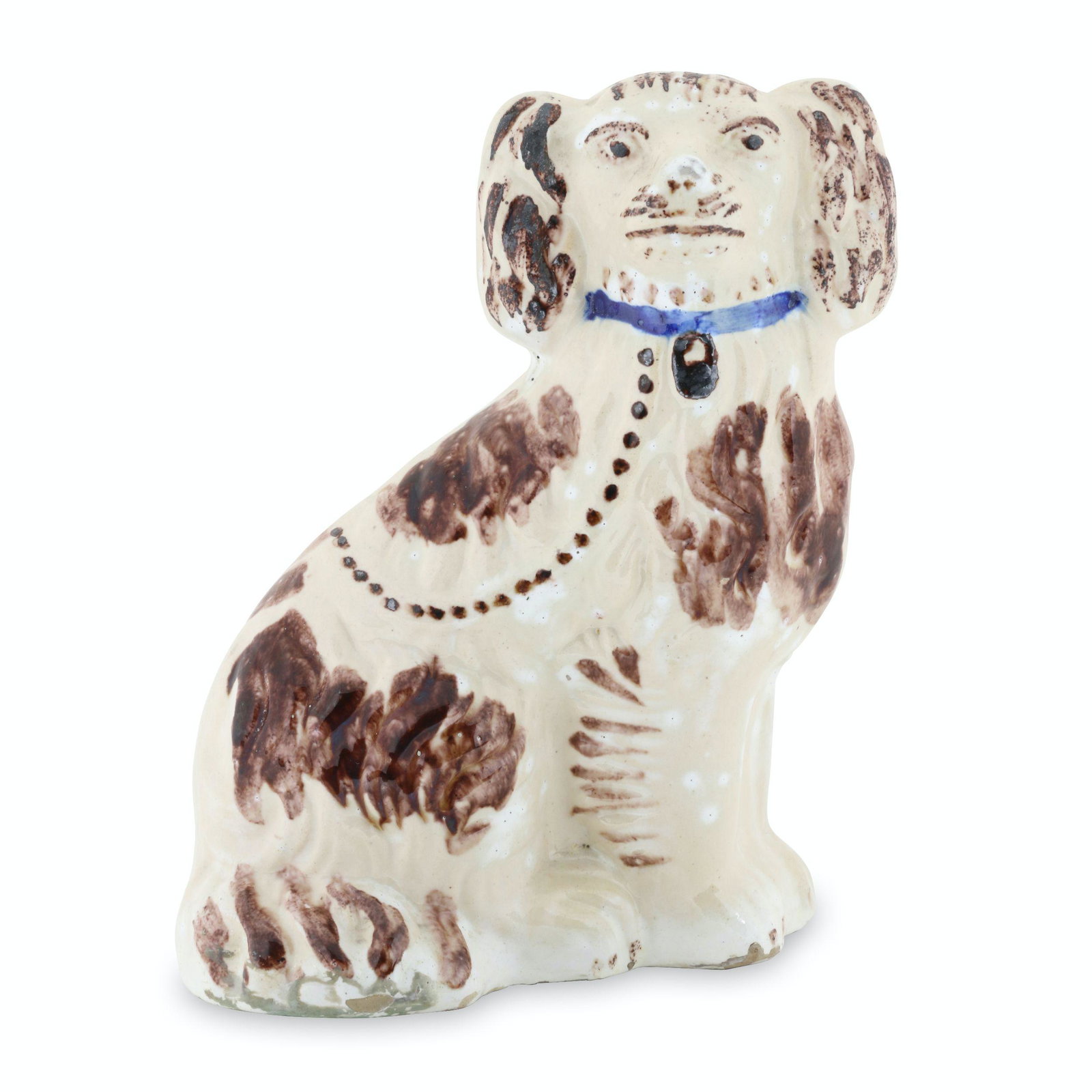 Burns Markham Earthenware Spaniel: Canadian. Earthenware. 9.25" x 6.75" x 3.75". Minor base edge flakes. John Wine Collection. $300/500.