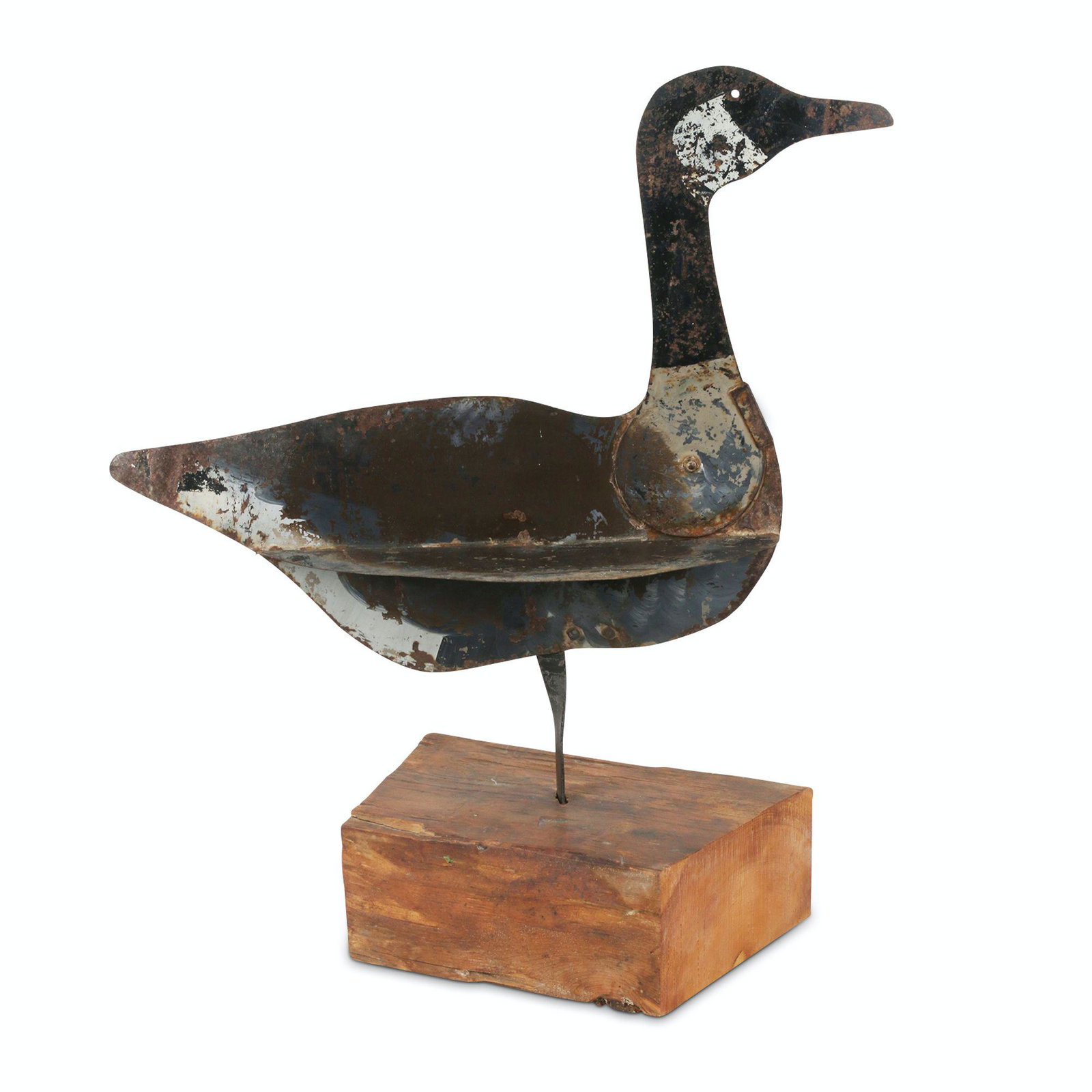 Jointed Flat Metal Canada Goose: 1920s. Jointed flat metal Canada Goose. Painted flat metal decoy on wooden base. 23" x 11" x 28". Don Pero Collection. $200/300.